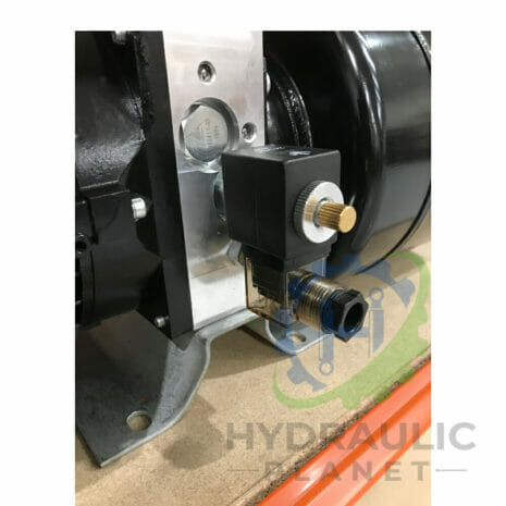 380V DOCK LEVELER POWER PACK-3 hydraulicplanet Close-up of a hydraulic solenoid valve with coil, connector, and adjustment knob—shown on a workbench—used in the 380V DOCK LEVELLER POWER PACK system.